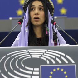 Yazidi woman from Iraq, Nadia Murad Basee, addresses members of the European parliament after receiving the European Union's Sakharov Prize for human rights in Strasbourg, eastern France, Tuesday Dec. 13, 2016. Two Yazidi women who escaped sexual enslavement by the Islamic State group and went on to become advocates for others have won the European Union's Sakharov Prize for human rights. The award, named after Soviet dissident Andrei Sakharov, was created in 1988 to honor individuals or groups who defend human rights and fundamental freedoms. 