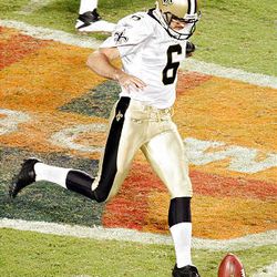 Thomas Morstead #6 of the New Orleans Saints kicks an onside kick against the Indianapolis Colts during Super Bowl XLIV.