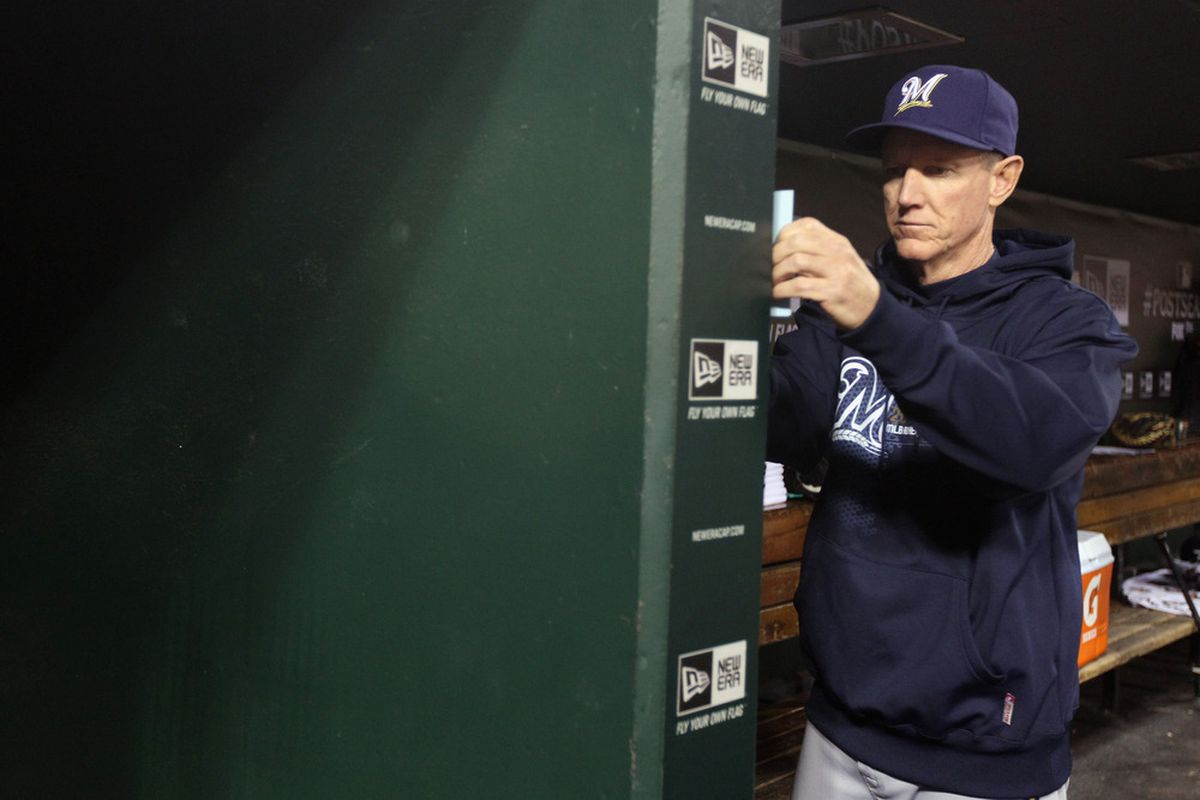 Ron Roenicke and his lineup card