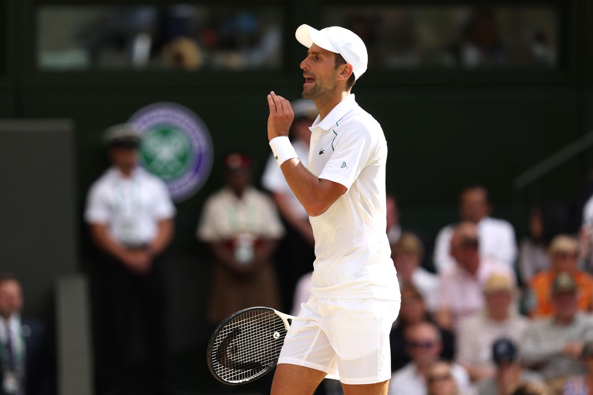 Novak Djokovic of Serbia reacts against Nick Kyrgios of Australia during their Men’s Singles Final match on day fourteen of The Championships Wimbledon 2022 at All England Lawn Tennis and Croquet Club on July 10, 2022 in London, England.