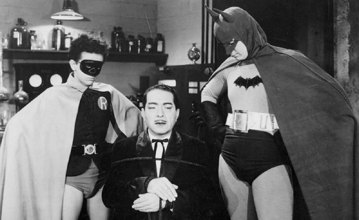 Batman and Robin stand over Japanese mastermind Doctor Daka (played by notably non-Japanese actor J. Carrol Naish) in the 1943 Batman serial