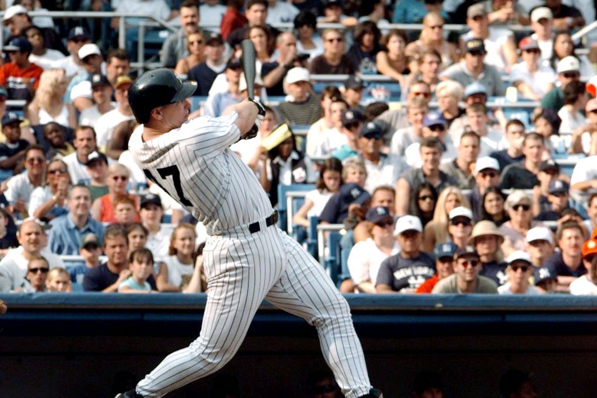 New York Yankees’ Shane Spencer slugs a grand slam homerun d