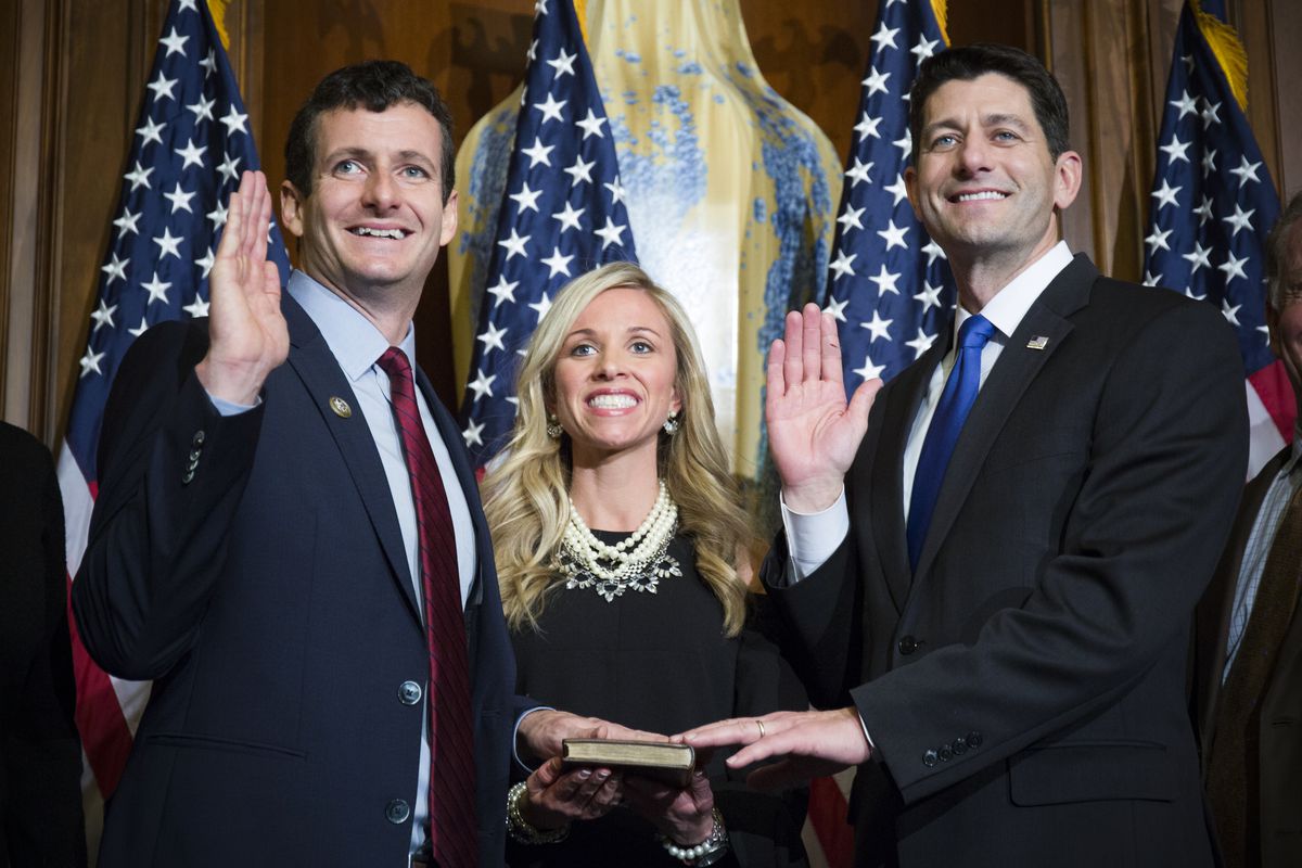 House Speaker Paul Ryan administers the House oath of office to Rep. Trey Hollingsworth (R-Ind), during a mock swearing in ceremony on Capitol Hill,  on January 3, 2017.