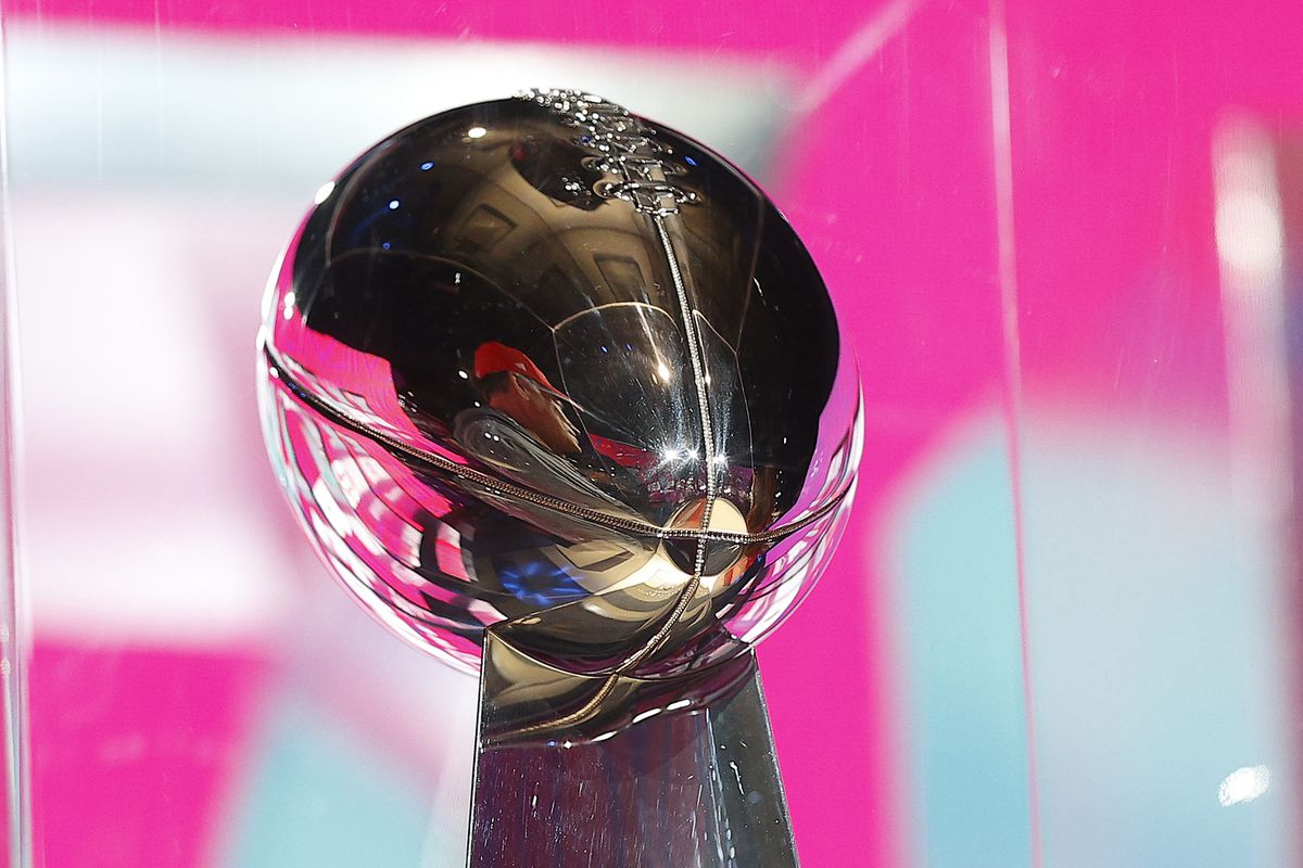 The Vince Lombardi Trophy sits on display at the NFL Experience prior to Super Bowl LVII on February 11, 2023 in Phoenix, Arizona.