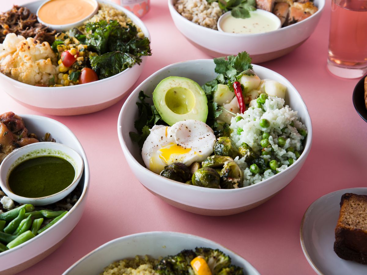 Colorful bowls are packed with egg and avocado at Brim.