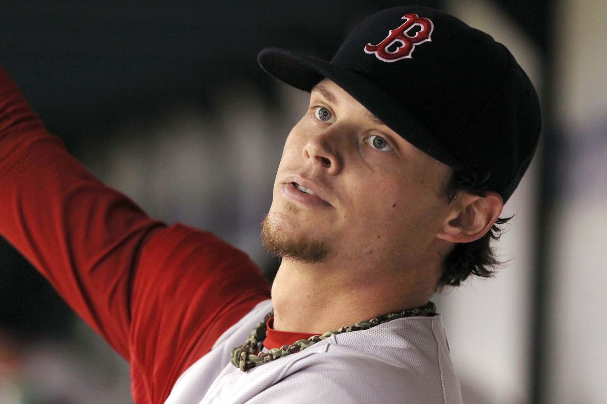 July 14, 2012; St. Petersburg, FL, USA; Boston Red Sox starting pitcher Clay Buchholz (11) in the dugout between innings against the Tampa Bay Rays at Tropicana Field. Mandatory Credit: Kim Klement-US PRESSWIRE