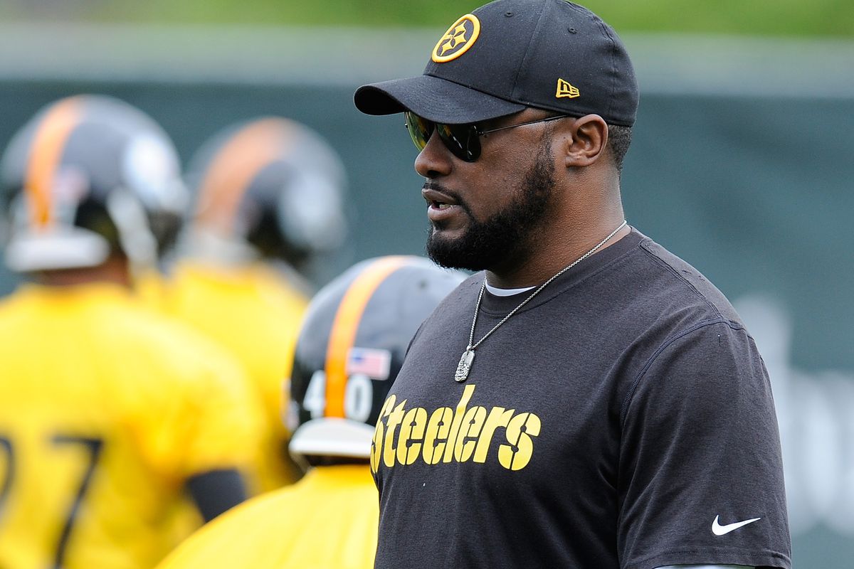 Steelers head coach Mike Tomlin watches over his team at practice from St Vincent College in Latrobe, Pa