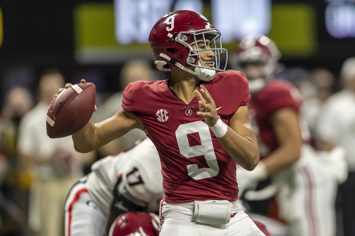 Bryce Young #9 of the Alabama Crimson Tide goes back to pass during a game between Georgia Bulldogs and Alabama Crimson Tide at Mercedes-Benz Stadium on December 4, 2021 in Atlanta, Georgia.