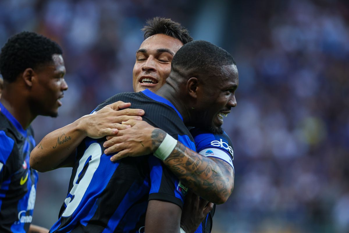 Marcus Thuram of FC Internazionale (R) celebrates with...