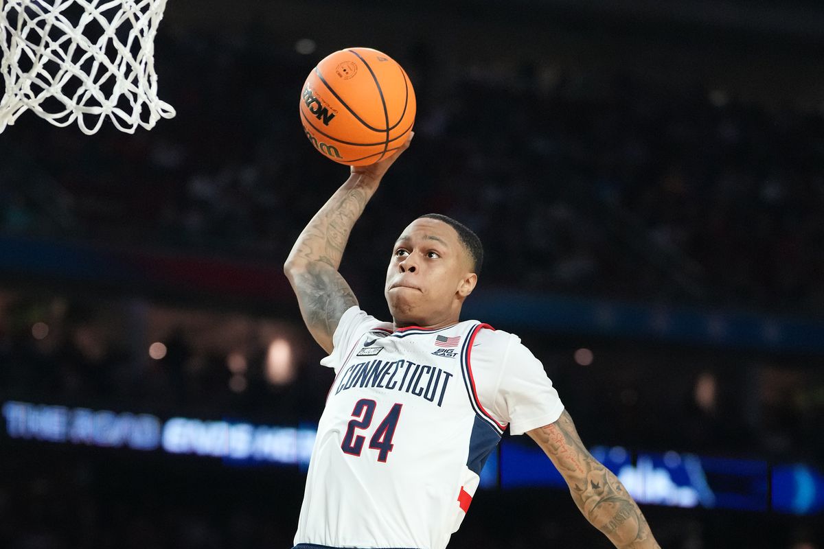 Jordan Hawkins #24 of the Connecticut Huskies dunks the ball during the NCAA Men’s Basketball Tournament Final Four championship game against the San Diego State Aztecs at NRG Stadium on April 03, 2023 in Houston, Texas.