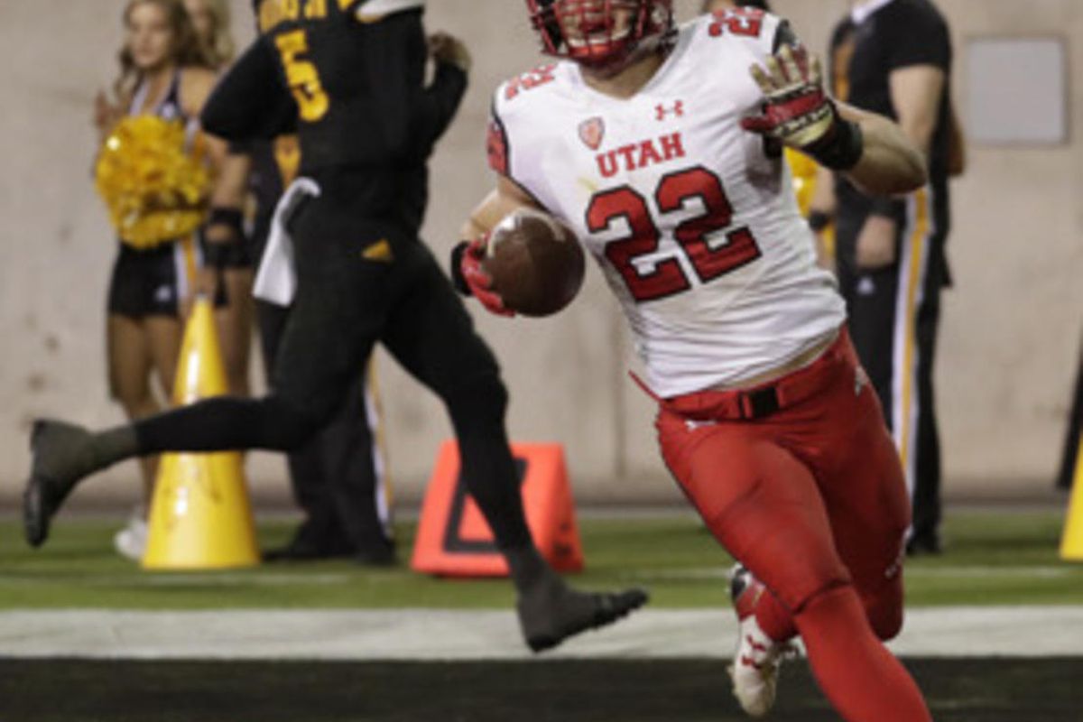 Utah defensive back Chase Hansen (22) scores a touchdown after an interception against Arizona State during the second half of an NCAA college football game, Thursday, Nov. 10, 2016, in Tempe, Ariz. (AP Photo/Matt York)  
