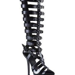 <b>Versace</b>, <a href="http://us.versace.com/Knee-High-Gladiator-Open-Sandals/DSL760R-DVTPV,en_US,pd.html">$2,925</a>