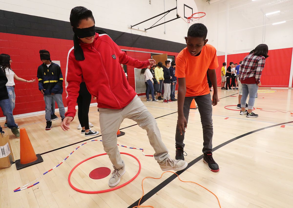Bryant Middle School students Andres Hurtado and Arefa Salih participate in a team-building exercise in Salt Lake City on Wednesday, Sept. 19, 2018. “(My partner) learned when I gave him instructions — he has to listen," Hurtado said.

The social-emotiona