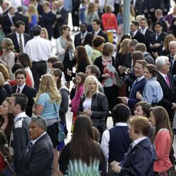 People gather outside the Conference Center before the start of the 183rd Annual General Conference of The Church of Jesus Christ of Latter-day Saints Saturday, April 6, 2013, in Salt Lake City.  The Church of Jesus Christ of Latter-day Saints is planning to build two new temples in Rio de Janeiro and Cedar City, Utah, the president of the Mormon church announced Saturday. Thomas S. Monson made the announcement in his opening address to more than 100,000 members of the church who've gathered in Salt Lake City for the church's 183rd semi-annual general conference.  (AP Photo/Rick Bowmer) 