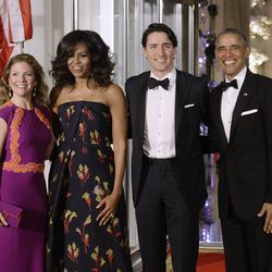 Sophie Grégoire-Trudeau, Michelle Obama, Justin Trudeau, and Barack Obama arrive at the state dinner.