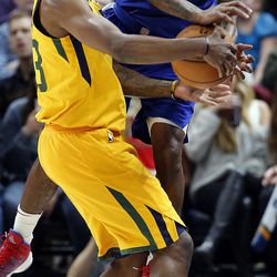 Utah Jazz forward Royce O'Neale steals the ball from LA Clippers guard Lou Williams during NBA basketball in Salt Lake City on Saturday, Jan. 20, 2018.
