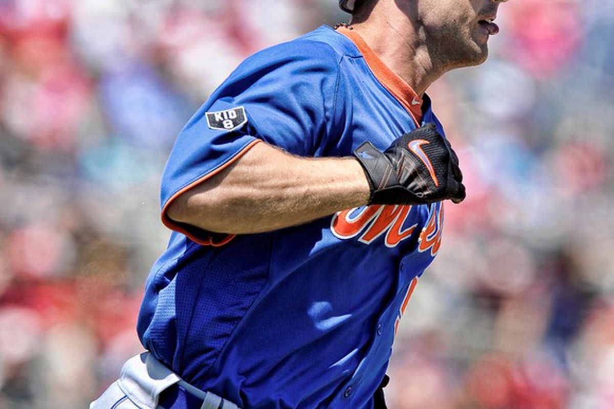 March 26, 2012; Jupiter, FL, USA;   New York Mets third baseman David Wright (5) runs out a single in the first inning of a spring training game against the St. Louis Cardinals at Roger Dean Stadium. Mandatory Credit: Brad Barr-US PRESSWIRE