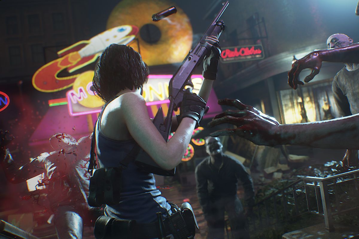 Jill Valentine reloads a shotgun while being pursued by zombies in a screenshot from Resident Evil 3 (2020).