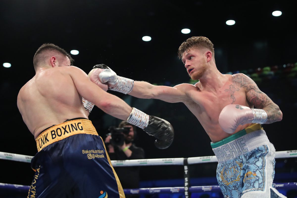 Archie Sharp punches Artjoms Ramlavs during the WBO European Super-Featherweight Title fight between Archie Sharp and Artjoms Ramlavs at Copper Box Arena on December 21, 2019 in London, England.