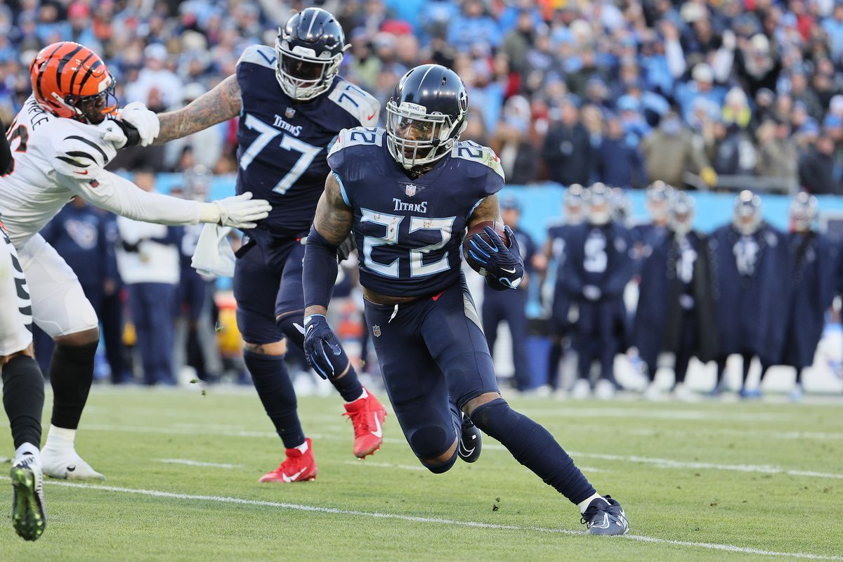 Derrick Henry #22 of the Tennessee Titans runs for a touchdown against the Cincinnati Bengals during the AFC Divisional Playoff at Nissan Stadium on January 22, 2022 in Nashville, Tennessee.