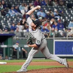 Sep 23, 2022; Kansas City, Missouri, USA; Seattle Mariners relief pitcher Chris Flexen (77) throws a pitch against the Kansas City Royals in the eighth inning at Kauffman Stadium. Mandatory Credit: Denny Medley