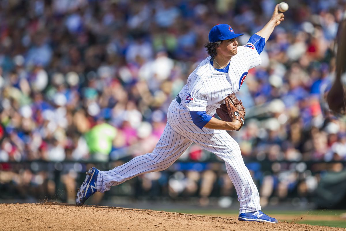 A rare photo: Edgar Olmos pitching for the Cubs in a spring game, March 4 in Mesa against the Angels.