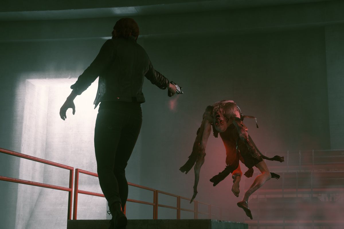 Control’s protagonist, Jesse, aims her gun at a grotesque, floating enemy