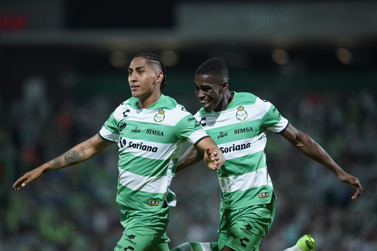 Hugo Rodriguez (L) of Santos celebrates after scoring his team’s second goal during the 7th round match between Santos Laguna and Cruz Azul as part of the Torneo Apertura 2022 Liga MX at Corona Stadium on August 6, 2022 in Torreon, Mexico.