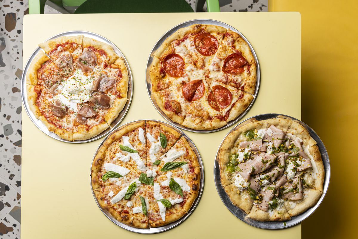 Surreal’s pizzas with various toppings