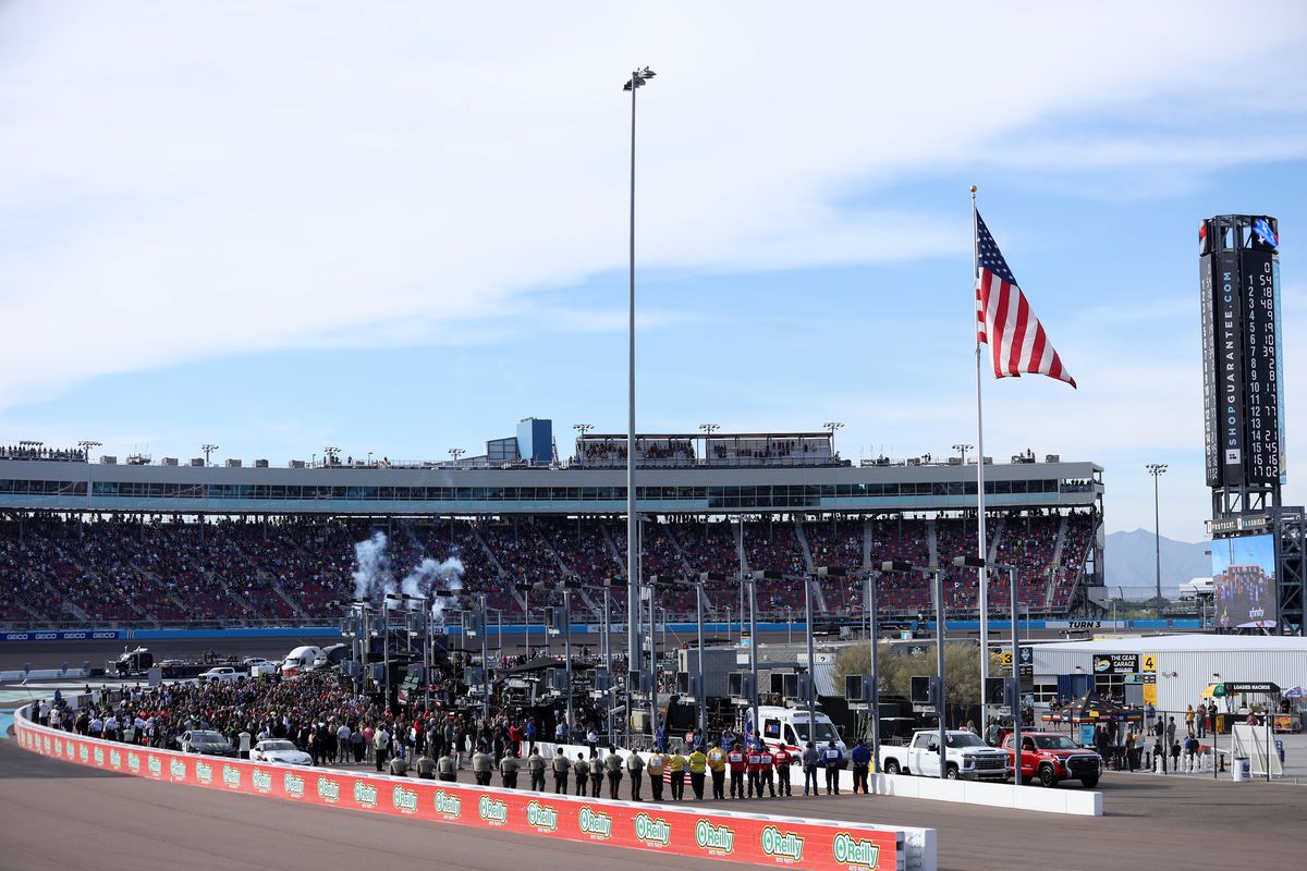 A general view of the grid during the national anthem prior to the NASCAR Xfinity Series Championship at Phoenix Raceway on November 05, 2022 in Avondale, Arizona.