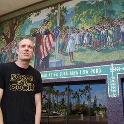 Chad Ford, BYU-Hawaii's director of the David O. McKay Center for International Cultural Understanding, in his Star Wars' "Force for Good" T-shirt. Ford, also an ESPN draft insider, is standing in front of a mosaic depicting the 1921 American flag-raising when then Elder David O. McKay visualized an institution of higher learning that would bring together and educate future international leaders.