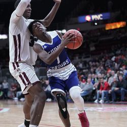 Belleville West’s EJ Liddell (32) pushes off Curie’s Elijah Pickens (1), Friday 03-15-19. Worsom Robinson/For the Sun-Times