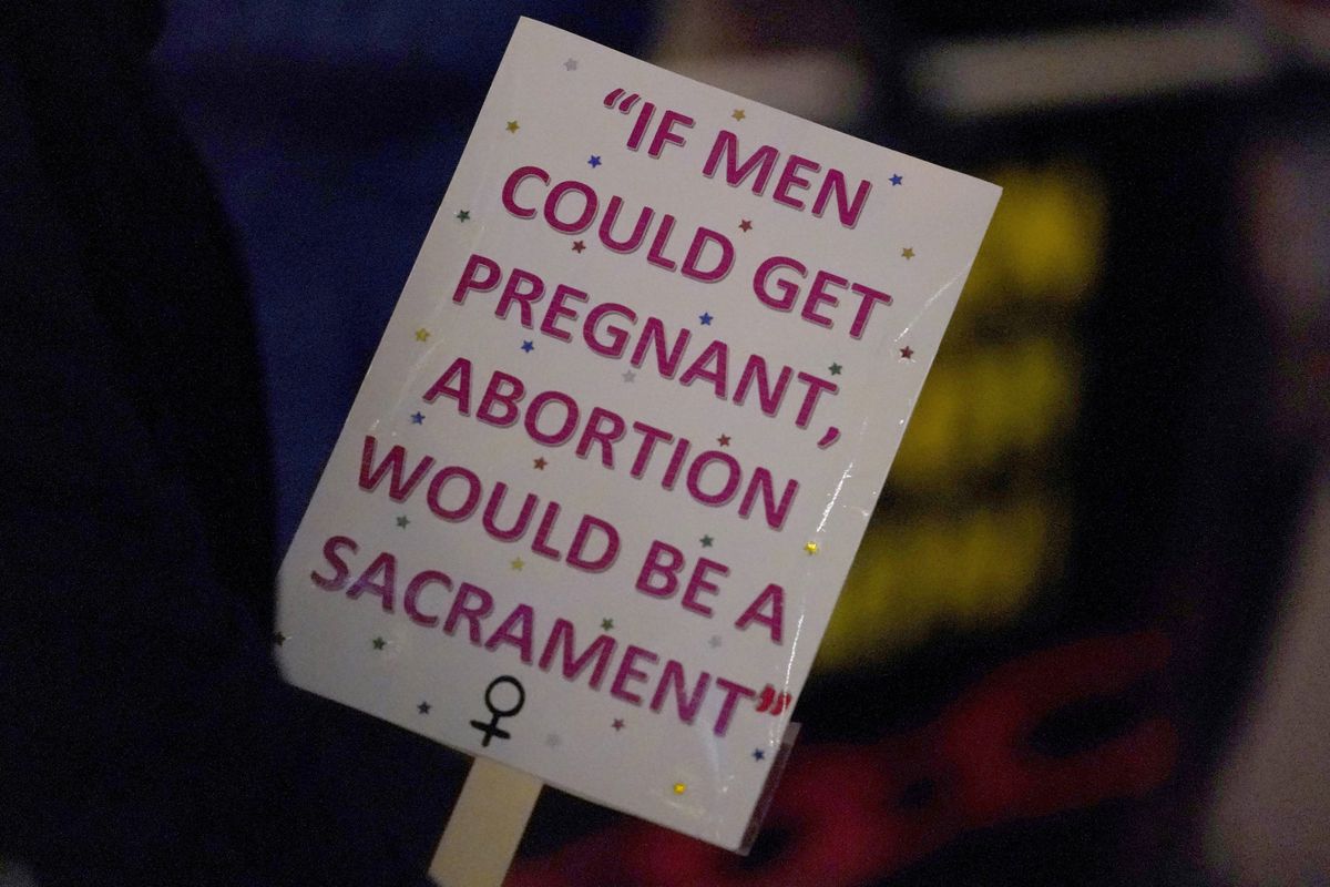 A supporter holds up a sign during an abortion rights rally outside Federal Plaza in Chicago, Wednesday, Dec. 1, 2021. The U.S. Supreme Court on Wednesday heard a Mississippi case that directly challenges the constitutional right to an abortion established nearly 50 years ago.