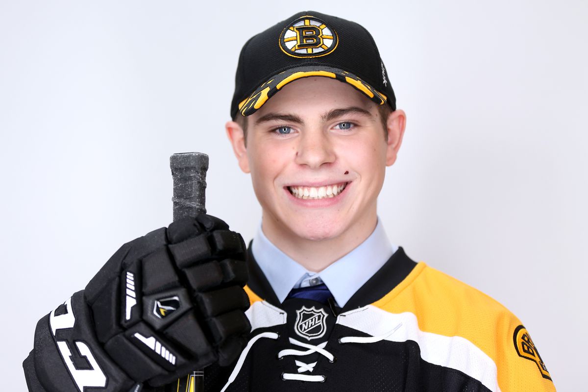 Happy to see you smiling after that November injury (Ridiculously photogenic Jake DeBrusk)