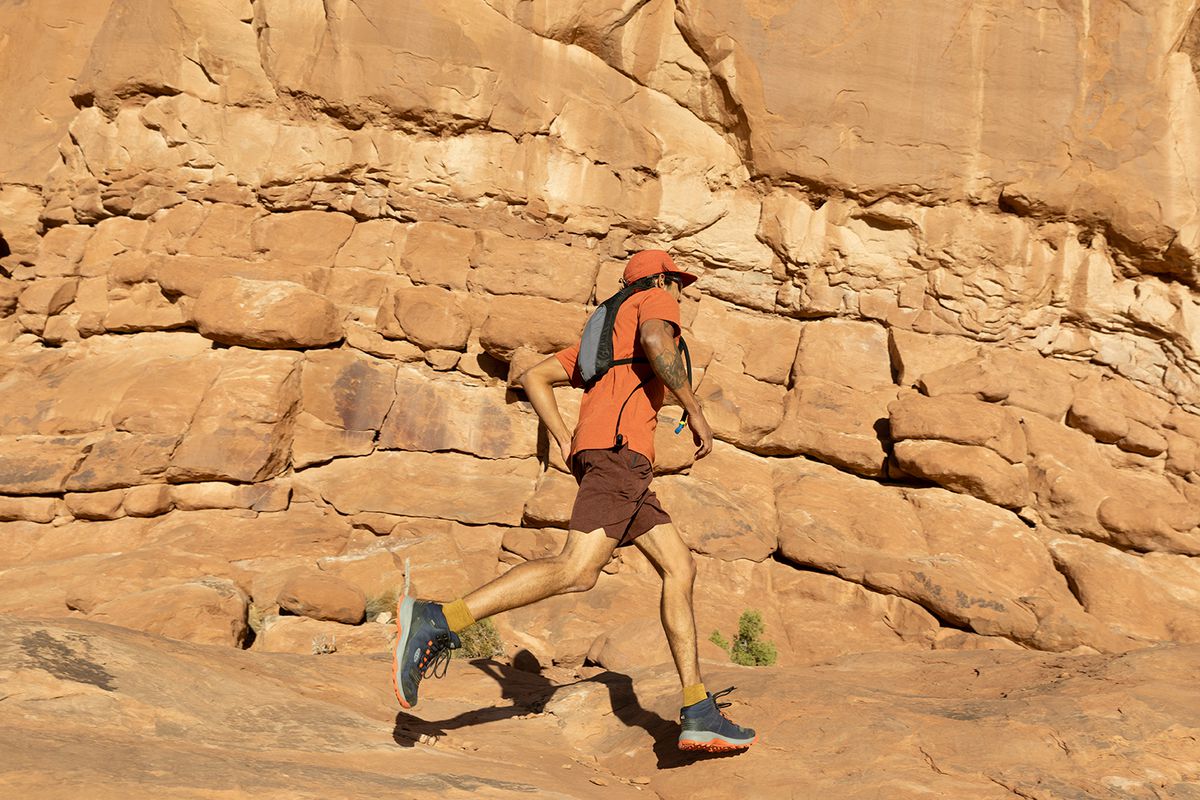 A man hiking down a trail 