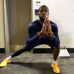 Utah Jazz forward Royce O'Neale (23) stretches before the Jazz play the Houston Rockets in Game 5 of the NBA playoffs at the Toyota Center in Houston on Tuesday, May 8, 2018.