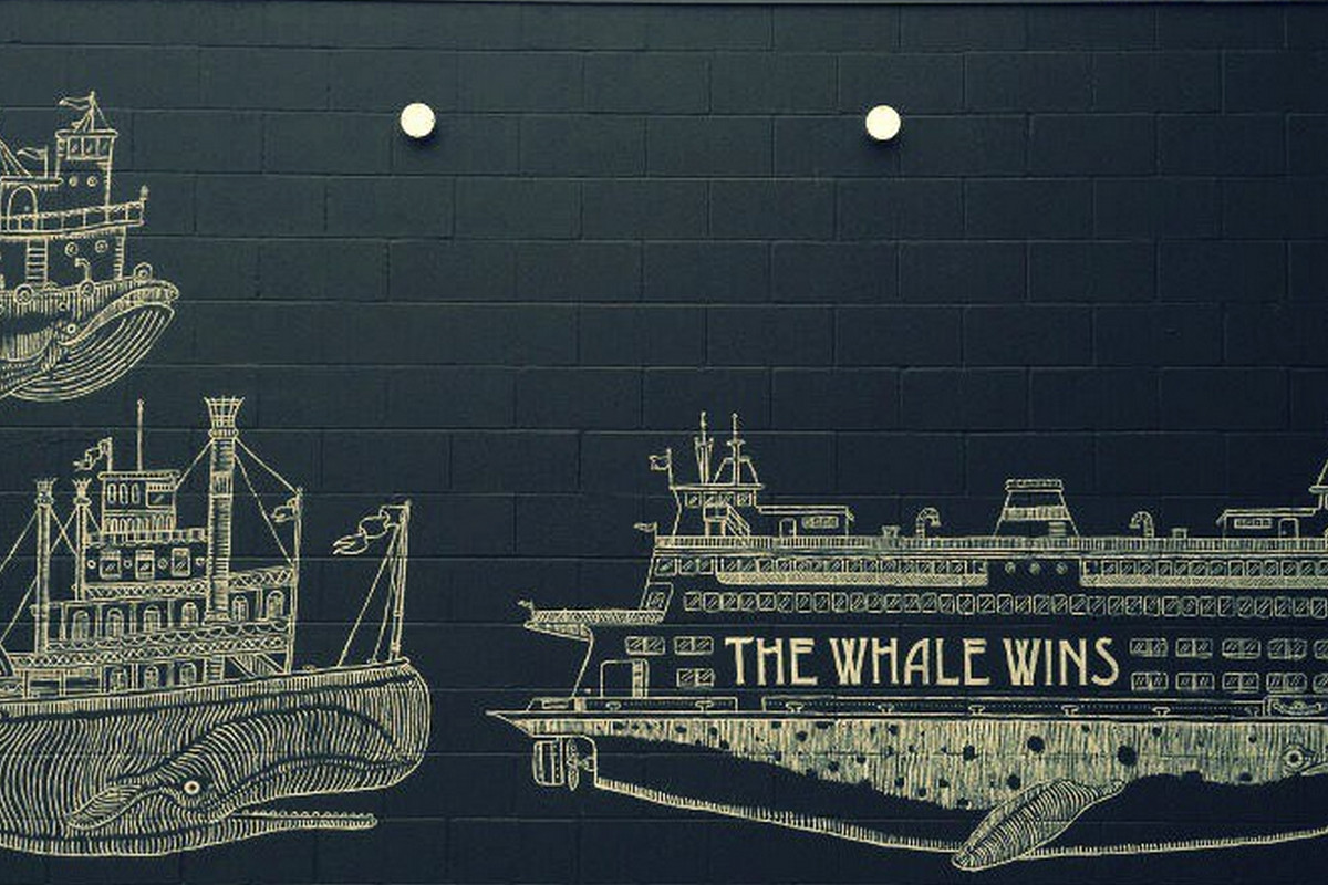 Kyler Martz's mural outside The Whale Wins.