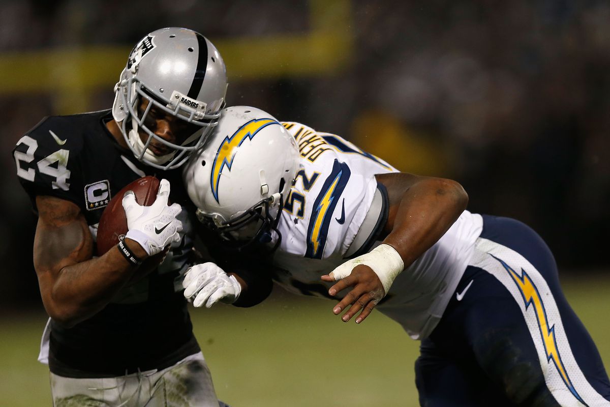 San Diego Chargers LB Denzel Perryman making a tackle against the Raiders