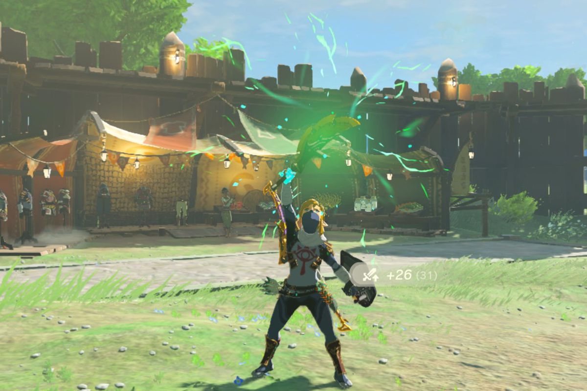 Link, in the Sheikah armor, lifts up a sword merged with a Black Lizalfos horn attached to it, freshly Fused with a green glow in Tears of the Kingdom