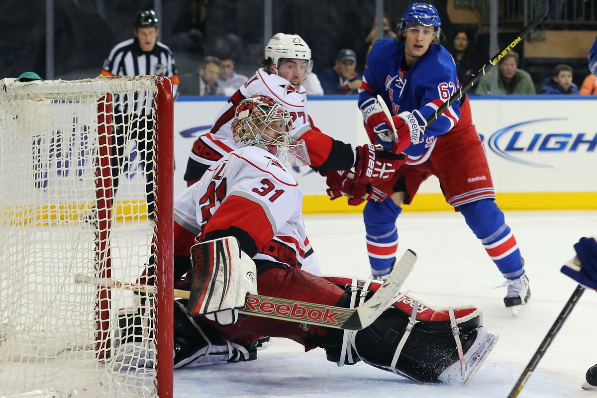 Dan Ellis makes a save against the Rangers on Monday night in New York