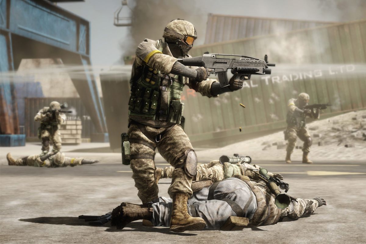 A soldier aims a rifle while covering a downed ally in a screenshot from Battlefield: Bad Company 2
