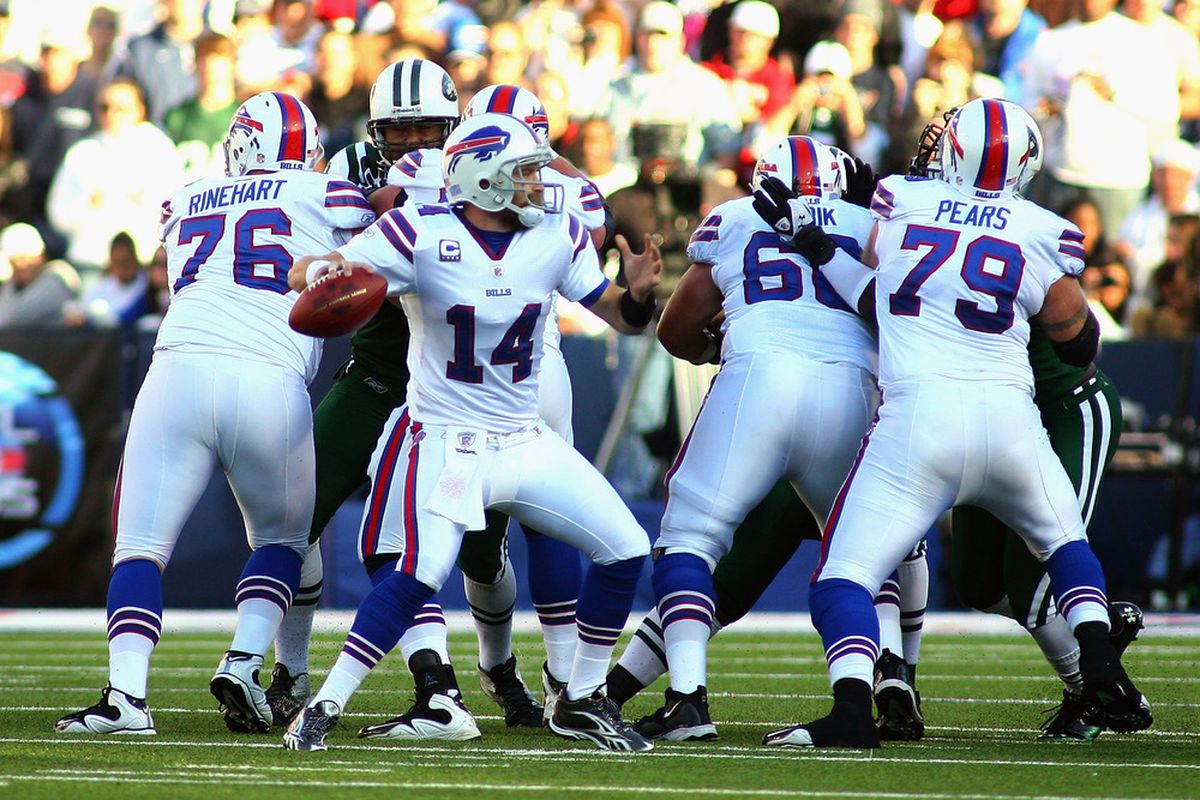 ORCHARD PARK, NY - NOVEMBER 06: Ryan Fitzpatrick #14 of the Buffalo Bills  looks to pass against the New York Jets  at Ralph Wilson Stadium on November 6, 2011 in Orchard Park, New York.New York won 27-11.  (Photo by Rick Stewart/Getty Images)