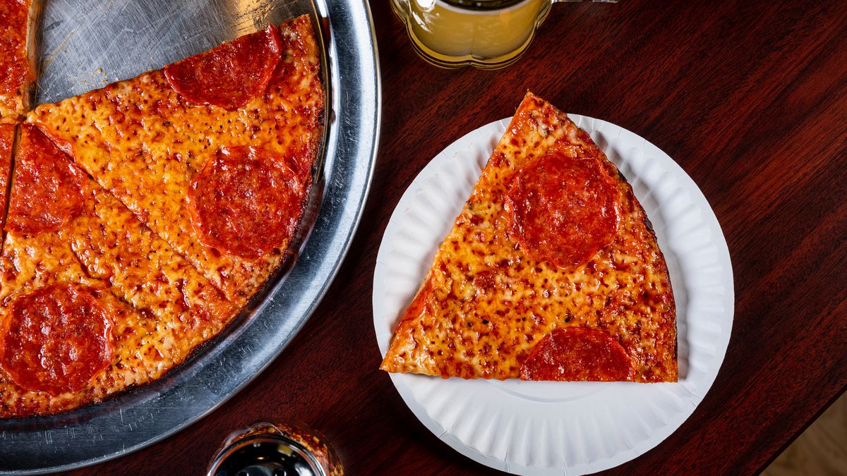 Wide, thin slices of pepperoni are one of 12 topping options at Colony Grill.