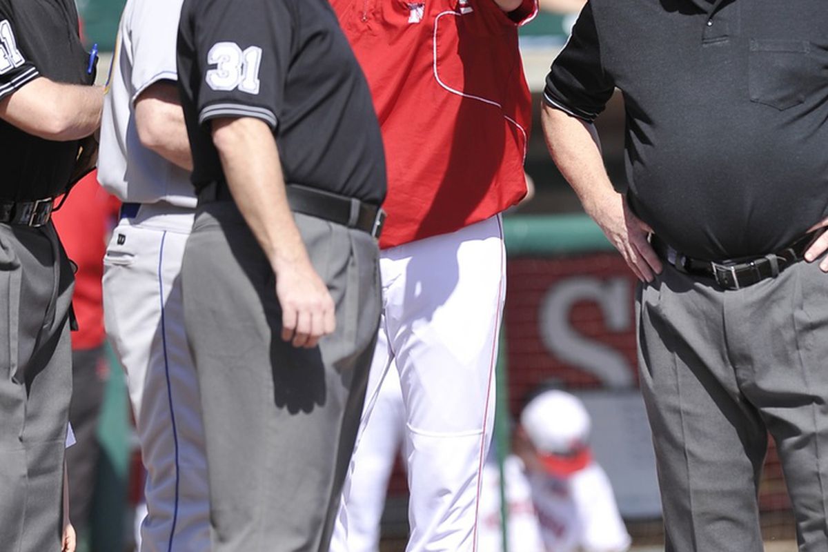 Coach Erstad is trying to figure out how to hold the fire to his team's feet. 
Photo by Dennis Hubbard.