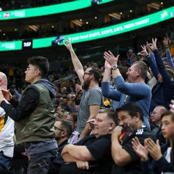 Utah Jazz cheer during the game against the Golden State Warriors at Vivint Arena in Salt Lake City on Tuesday, Jan. 30, 2018.