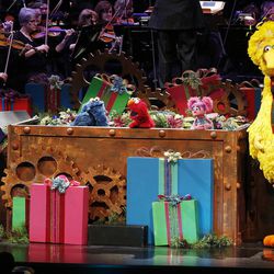 Santino Fontana and the "Sesame Street" Muppets perform with the Mormon Tabernacle Choir during the choir's annual Christmas concert in Salt Lake City Thursday, Dec. 11, 2014. 
