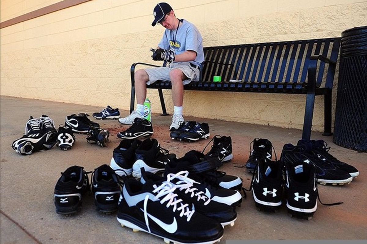 Mar. 5, 2012; Lakeland, FL, USA; Detroit Tigers club house manager Matthew Hagelin cleans cleats prior to the game against the Toronto Blue Jays at Joker Marchant Stadium. Mandatory Credit: Andrew Weber-US PRESSWIRE