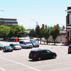 Vehicles make left turns in Salt Lake City on Monday, June 25, 2018.