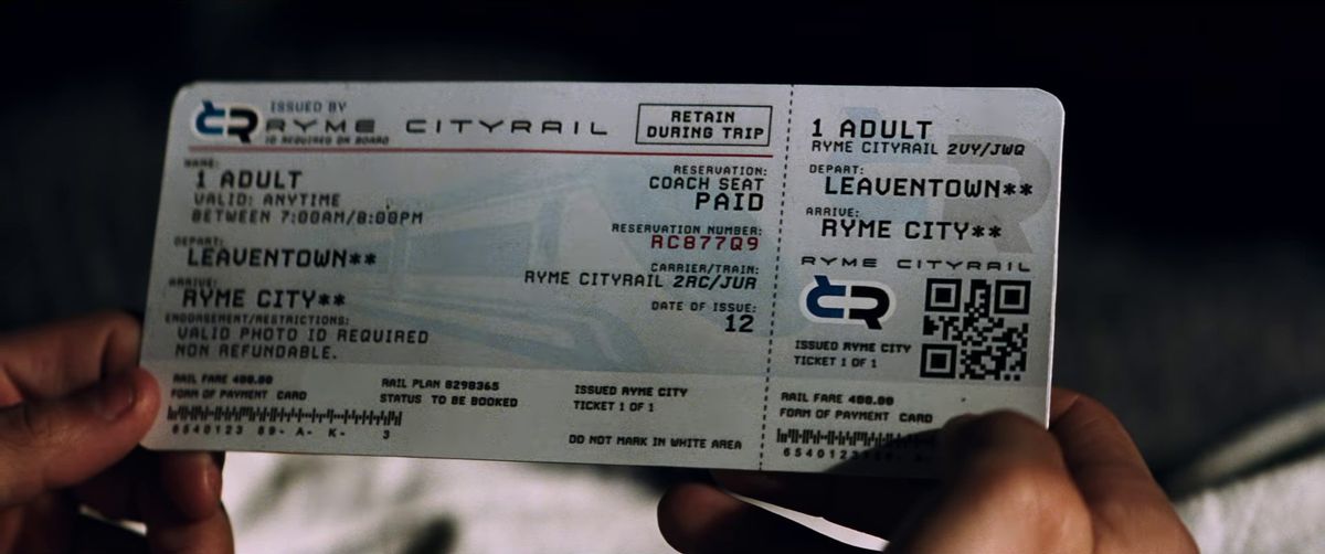 Detective Pikachu - Tim holding a one-way Ryme Cityrail ticket