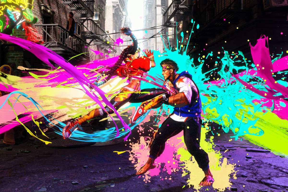 Splash paint effects in bright neon colors surround two fighters in Street Fighter 6
